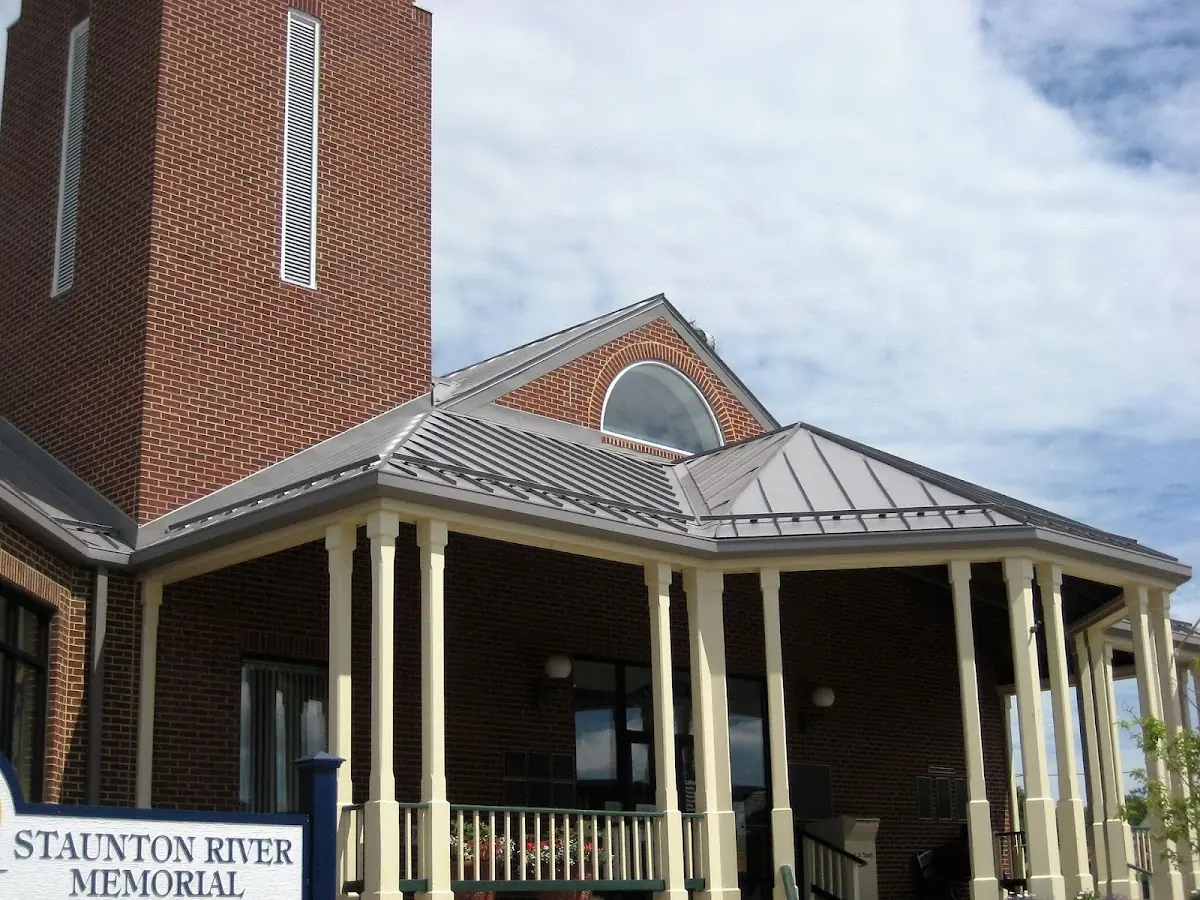 Skilled roofing craftsmen working on a residential roof in Windsor Square